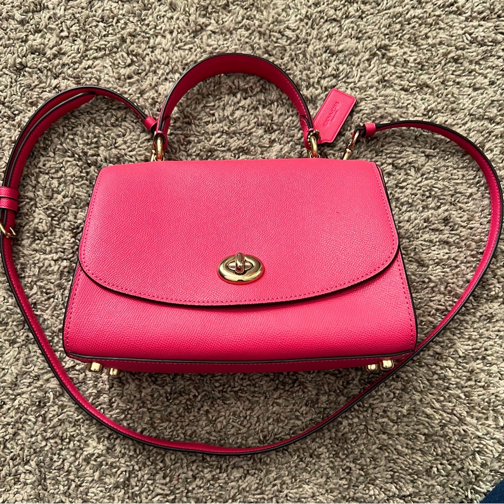Beautiful pink coach bag.